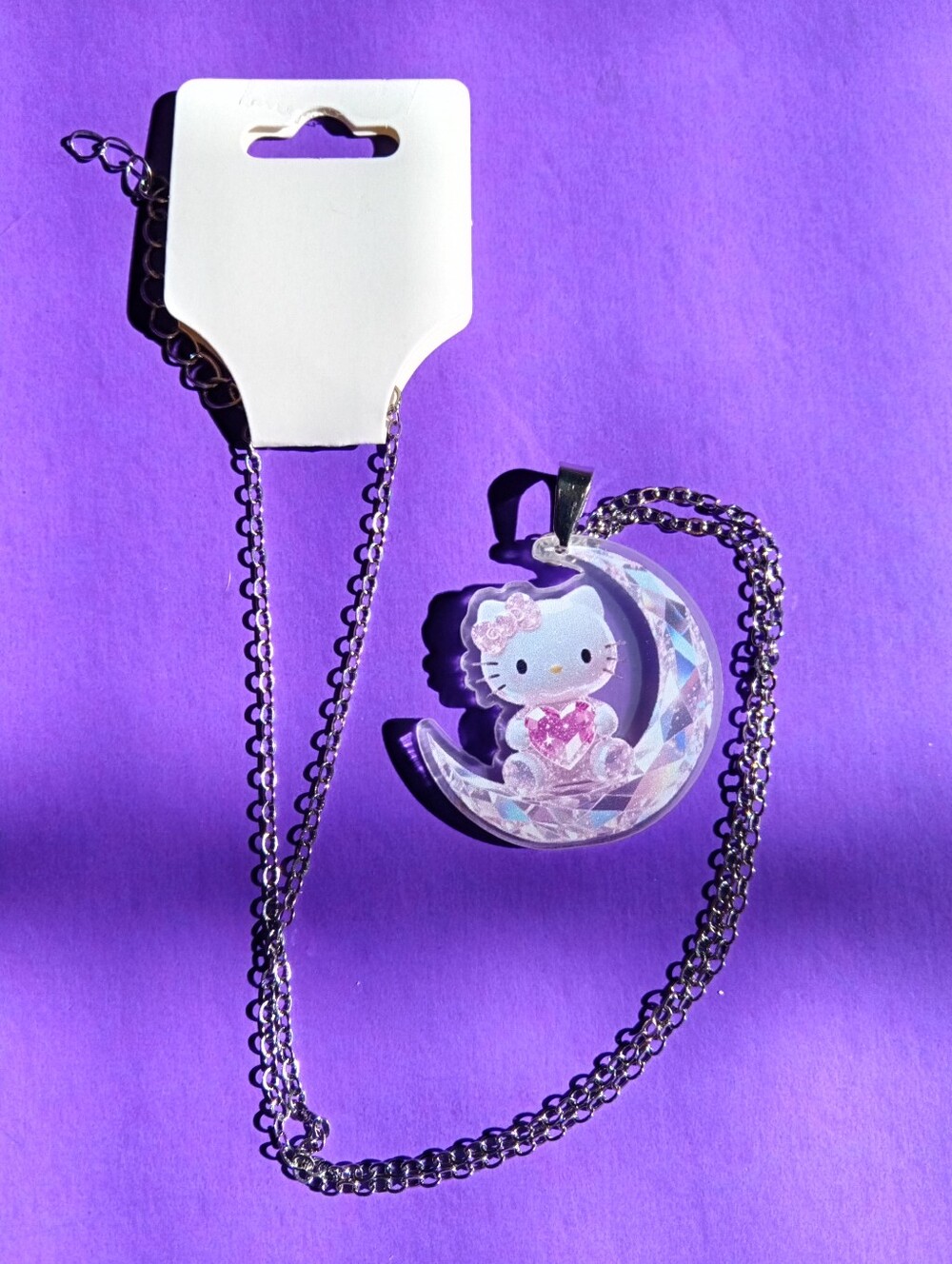 Hello Kitty Moon Pendant Necklace in Iridescent White